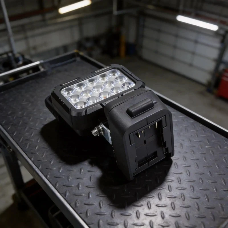 Killer Heavy-Duty Handheld Flood Light Featuring 15 High-Intensity LEDs That Deliver Badass Coverage Perfect For Dimly Lit Jobsites Garages Or Backyard Campouts Seamlessly Swaps Into Any Standard 18V Li-Ion Battery Pack For Maximum Versatility On Every
