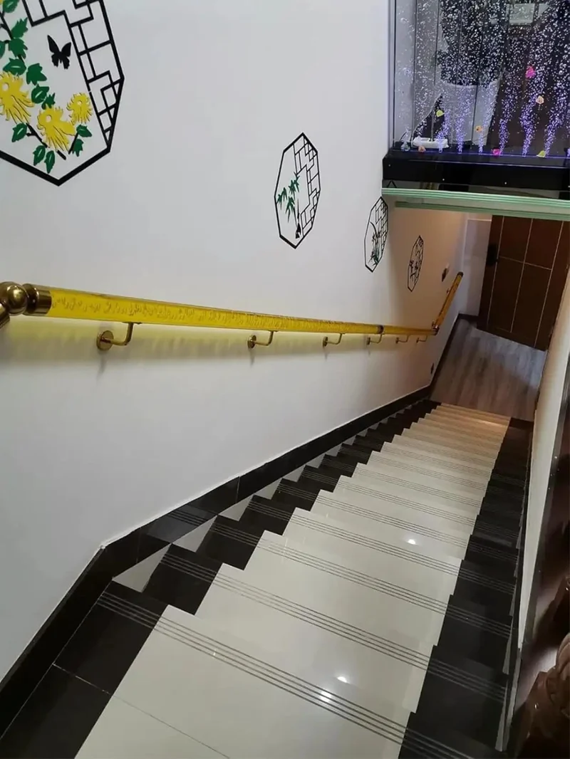 Clear Acrylic Stair Handrail With Gold Brackets And Wall Mount Safety Rail For Indoor Steps Featuring Lockdown Grip And Straight Up Ridiculously Strong Frame Custom Lengths Picked For Your Ultimate Setup
