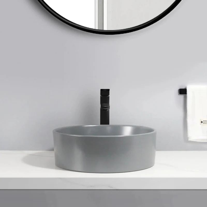 Sleek Round Ceramic Vessel Sink In Matte Gray Finish For A Pretty Sweet Bathroom Glow Up Durable Countertop Basin With Standard Drain Size And Smooth Edge Design
