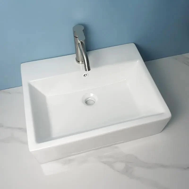 Slick Ceramic Vessel Sink Bathroom Washbasin Above Ground Wall Mount Basin With Sharp Modern Luxury Lines Smooth Glaze Finish Effortless Install Top Shelf Durable Contemporary Fixtures
