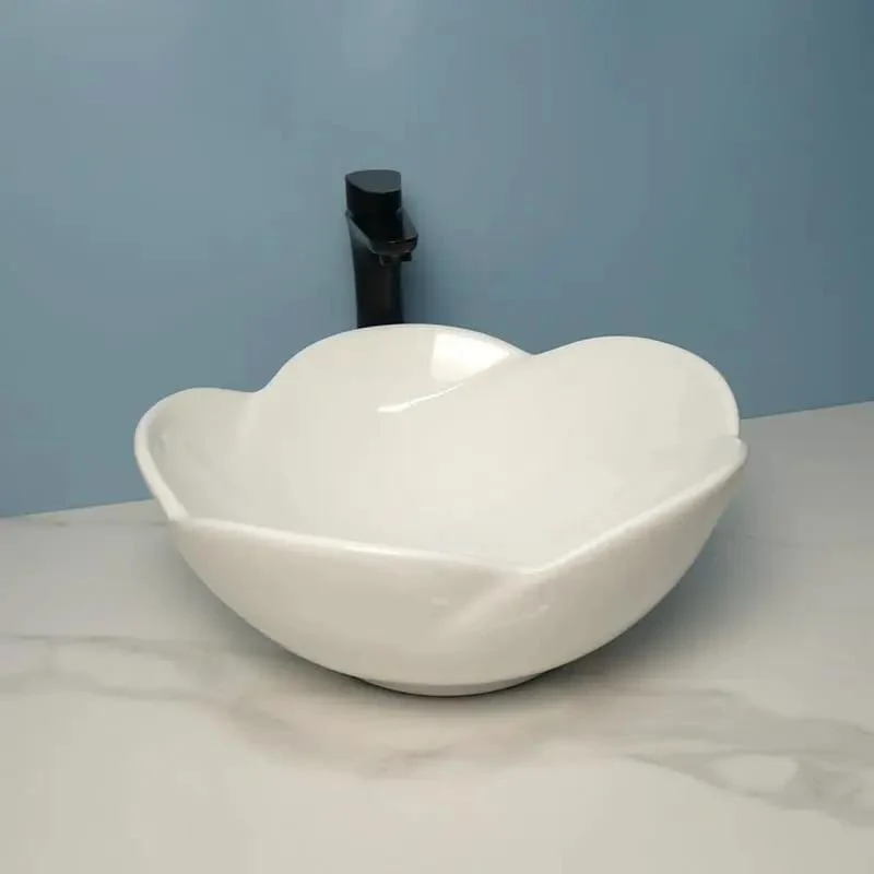 Top Tier Ceramic Vessel Sink For Bathroom Counter Straight Up Sleek White Wash Basin With Smooth As Glass Finish Hassle Free Cleaning And Low Key Stunning Petal Shape For Effortless Daily Use