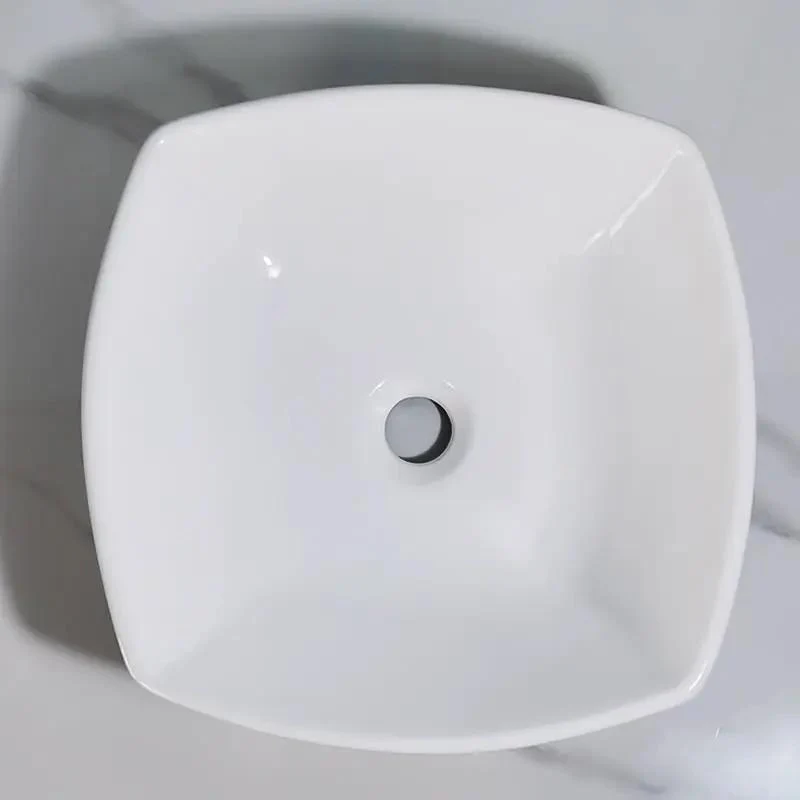 Sleek Square Ceramic Vessel Sink for Your Oasis. Modern Countertop Wash Basin with High Gloss Finish. Easy Wipe Clean Design That Slays and Never Yellows. Hotel Grade Quality for a Bougie Vibe. Durable Stain Resistant Sink.
