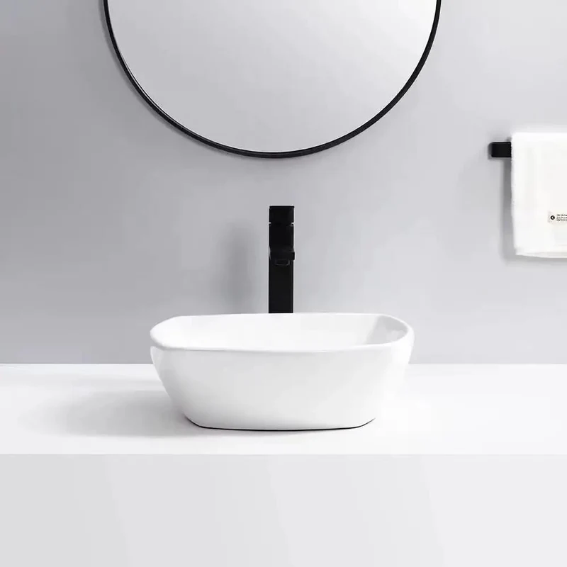 Sleek Square Ceramic Vessel Sink for Your Oasis. Modern Countertop Wash Basin with High Gloss Finish. Easy Wipe Clean Design That Slays and Never Yellows. Hotel Grade Quality for a Bougie Vibe. Durable Stain Resistant Sink.