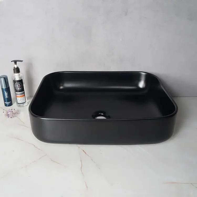 Premium Black Ceramic Vessel Sink For Above Counter Bathroom Vanity Glossy Countertop Wash Basin With Smooth Curves And Hassle Free Install For Modern Hotels Or Upscale Home Fixtures
